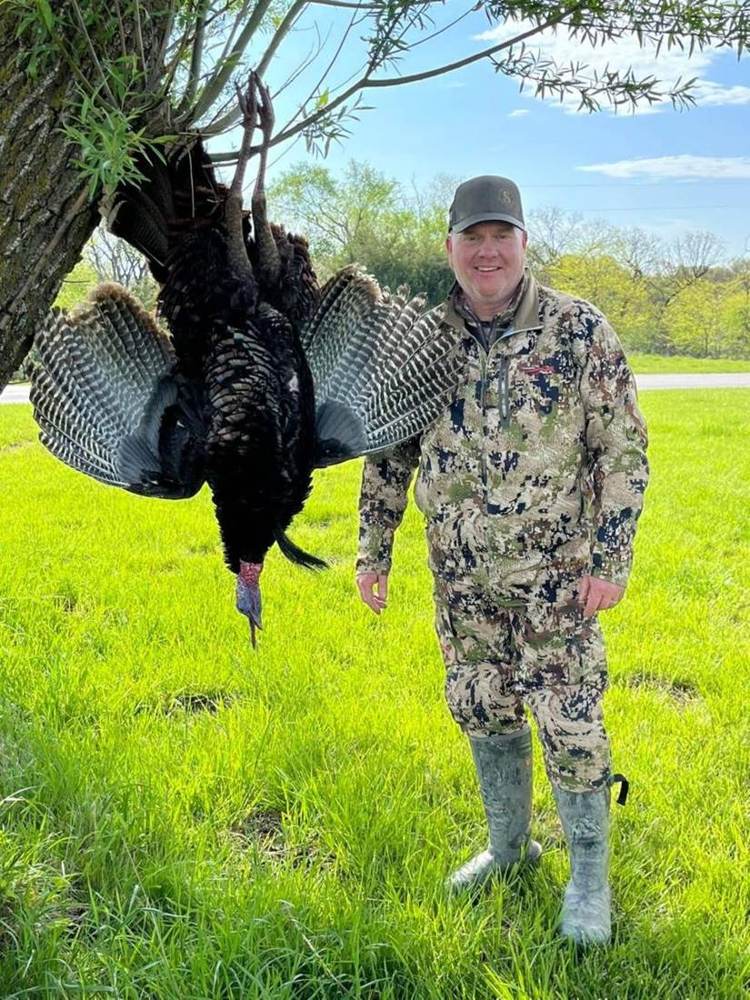 Hunter with a Missouri gobbler