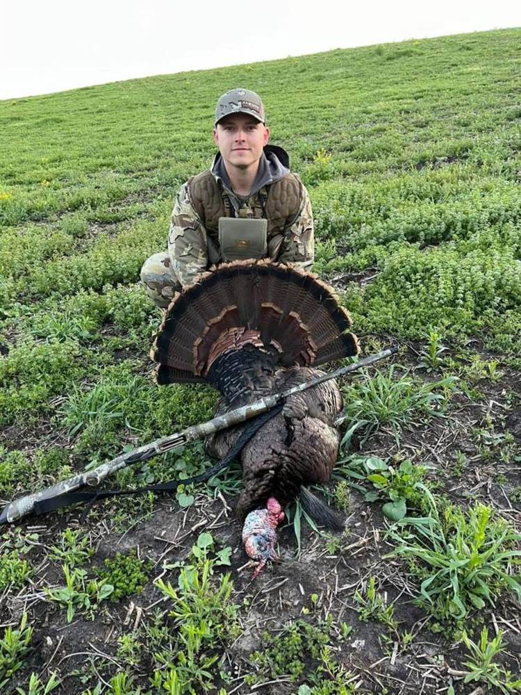Young hunter with a spring gobbler